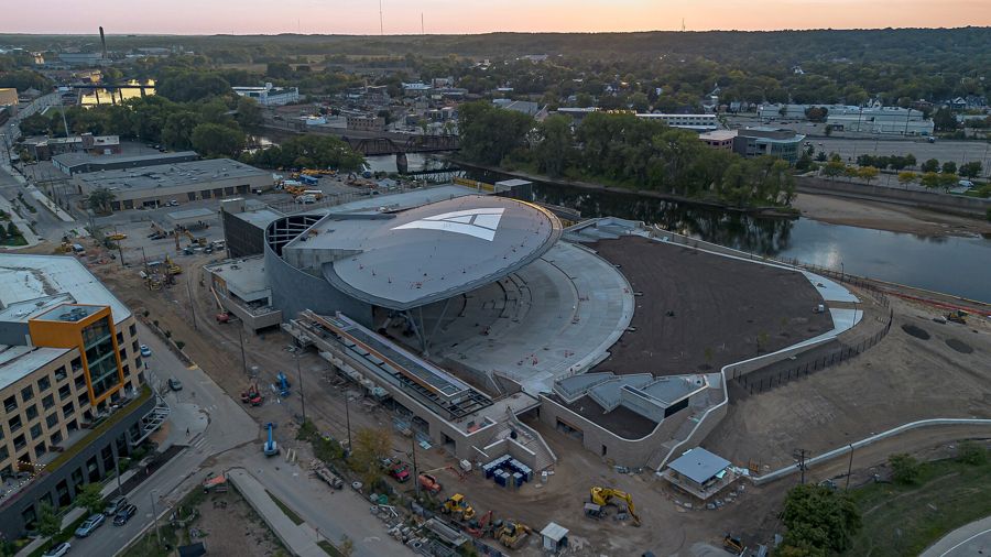 Aerial view of the Acrisure Amphitheater under construction on the Grand River, 2025