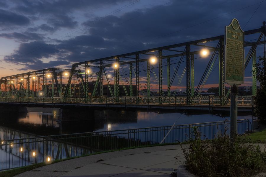 The Grand River and Sixth Street Bridge in Grand Rapids at dusk